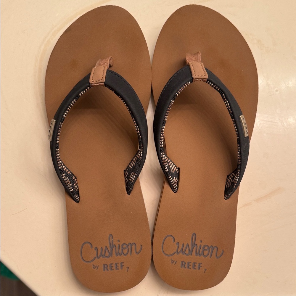 Reef Cushion Sandals with Black Straps and Brown Soles